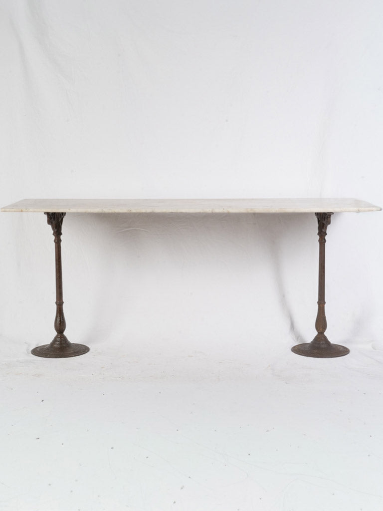 Weathered patina marble topped console