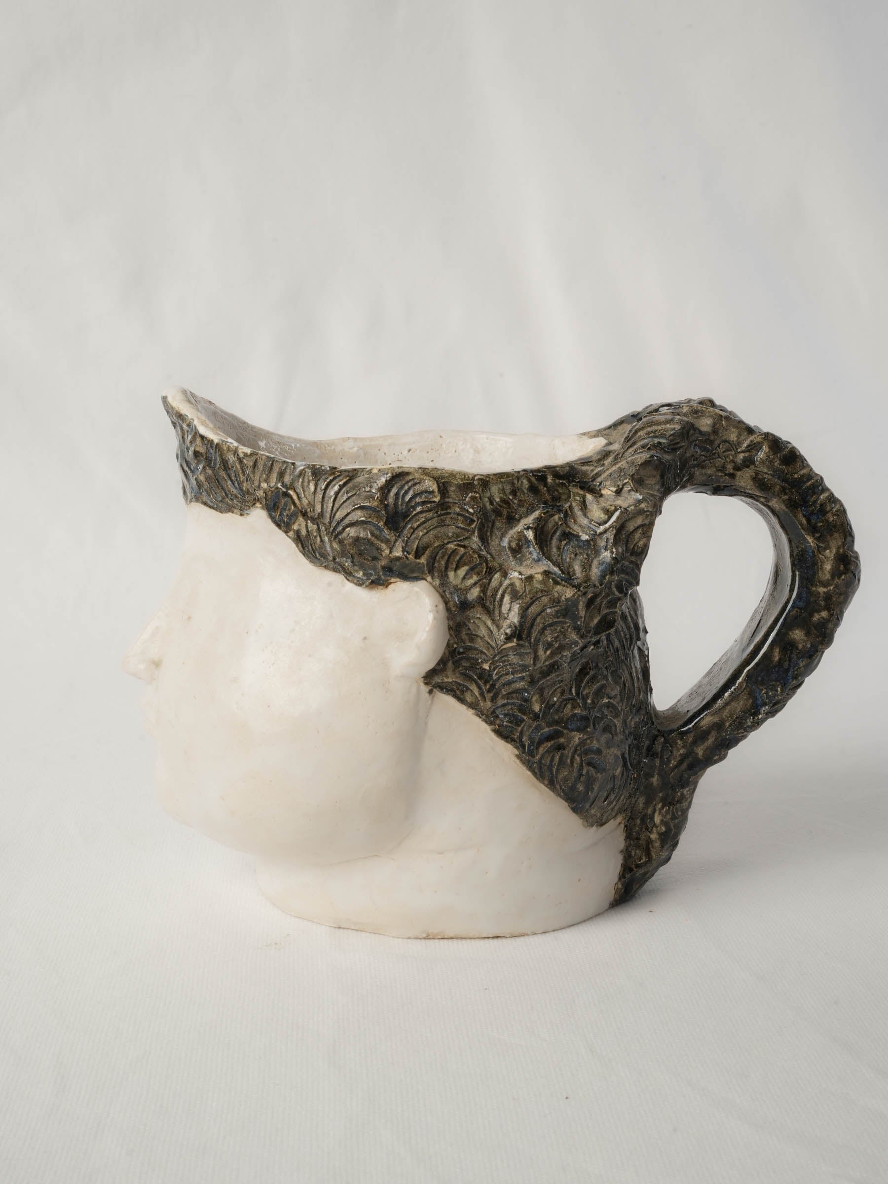Contemplative-gaze Vallauris utensil holder