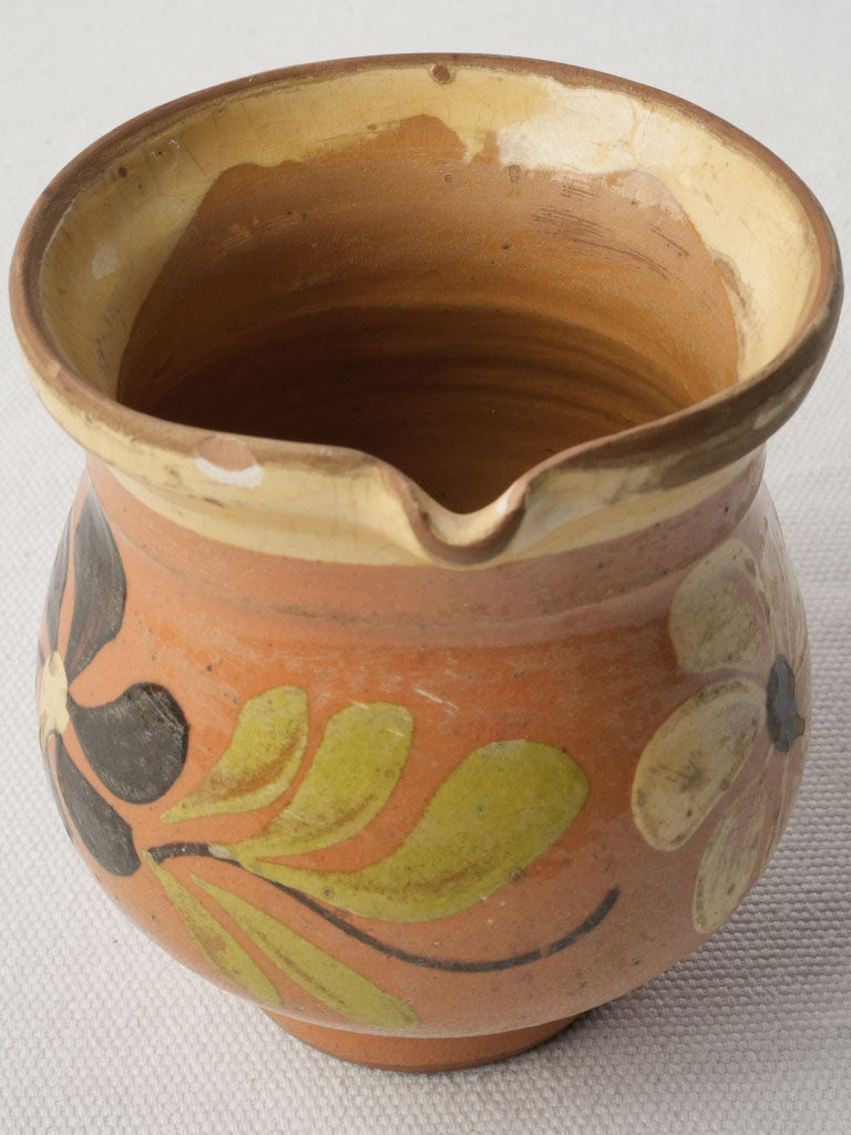 Hand-painted folk art milk jug