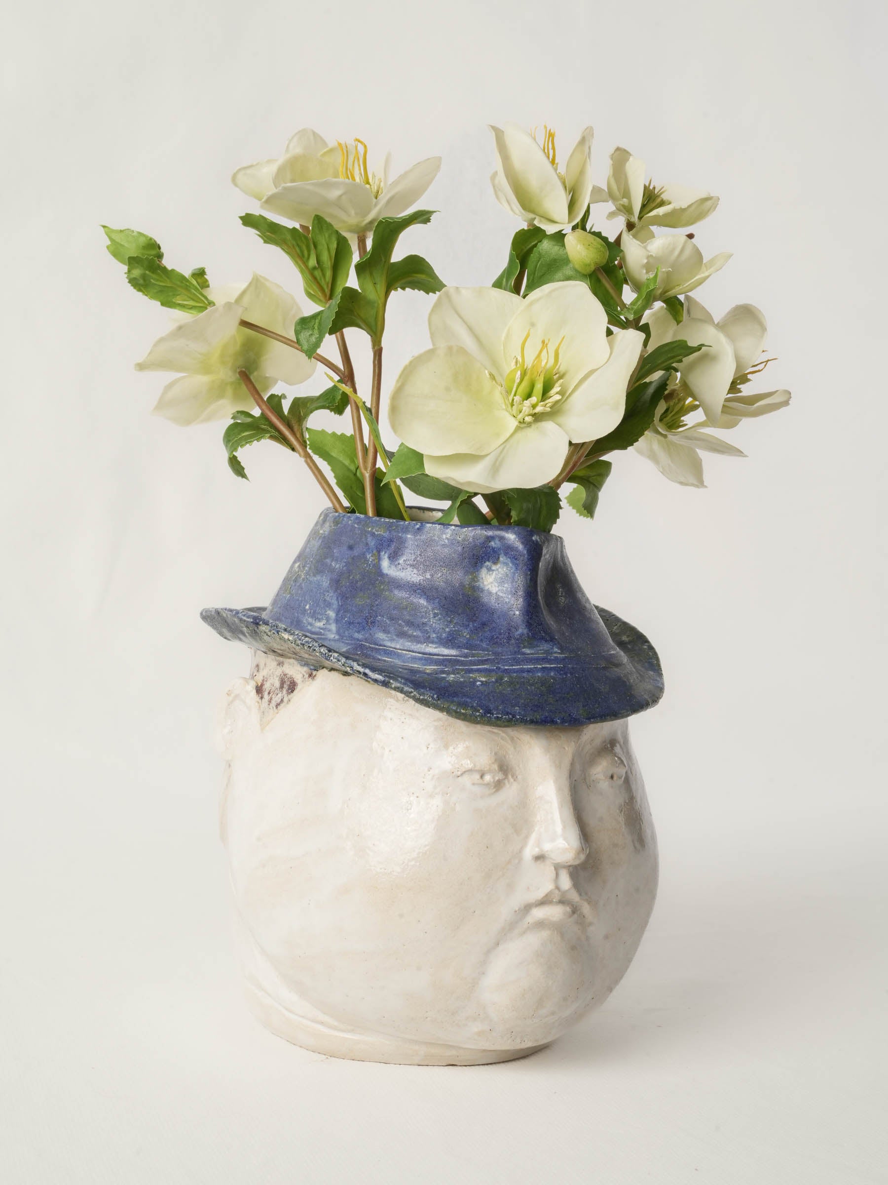 Expressive figural stoneware vessel