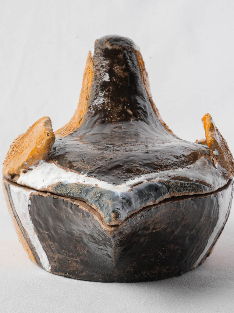 Textured feather-design ceramic piece