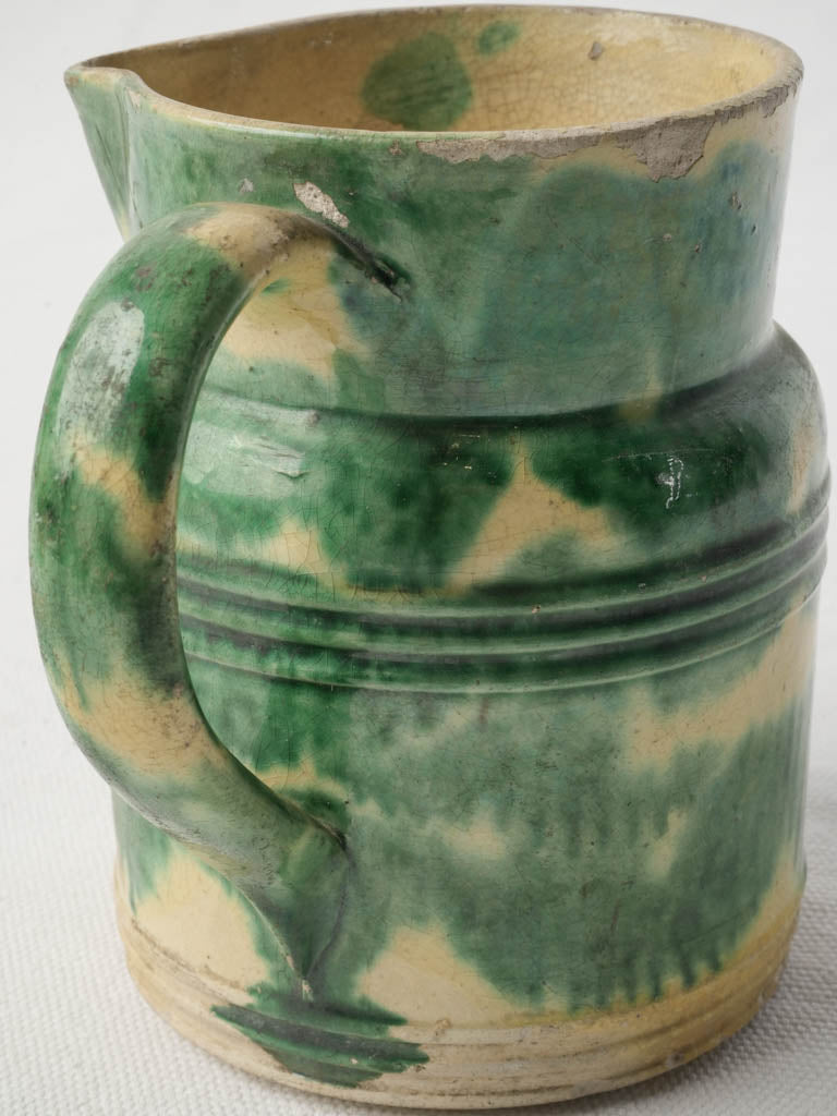 Elegant reeded-handle green pitcher
