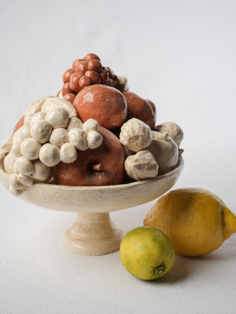Exquisite handcrafted stoneware fruit centerpiece