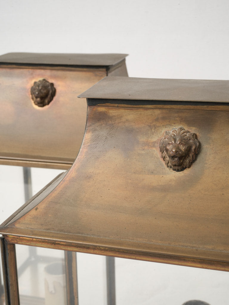 Classic lion head motif sconces