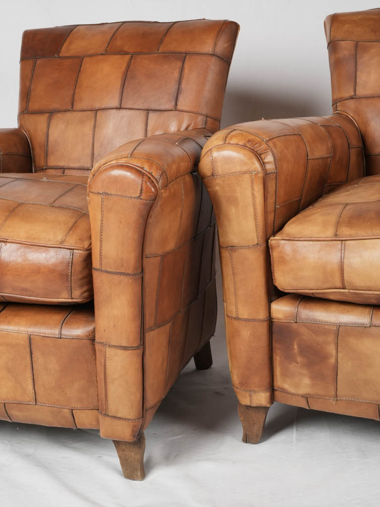 Vintage French leather armchair pair