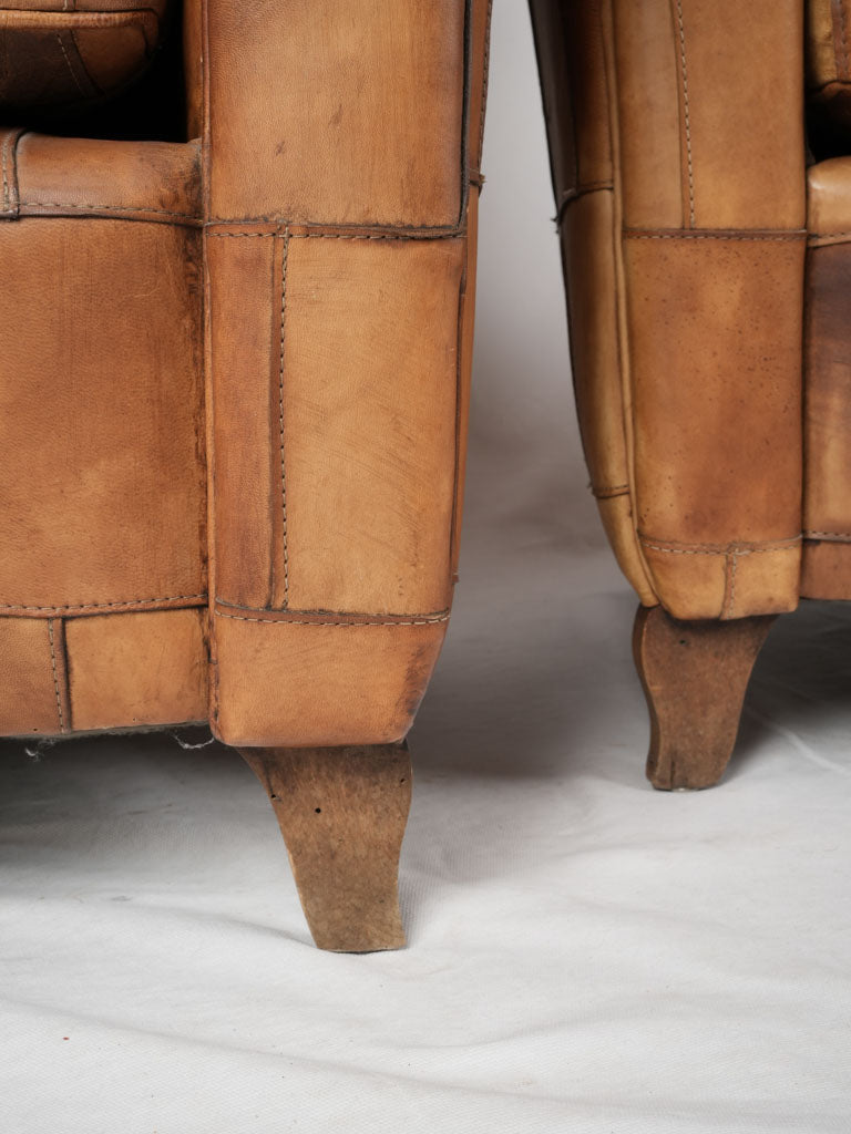 Chic reupholstered patchwork leather chairs