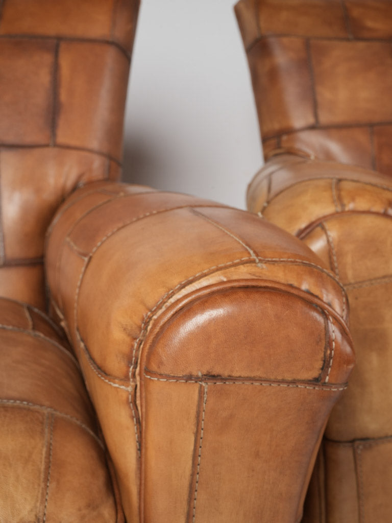 Refined aged leather club seating