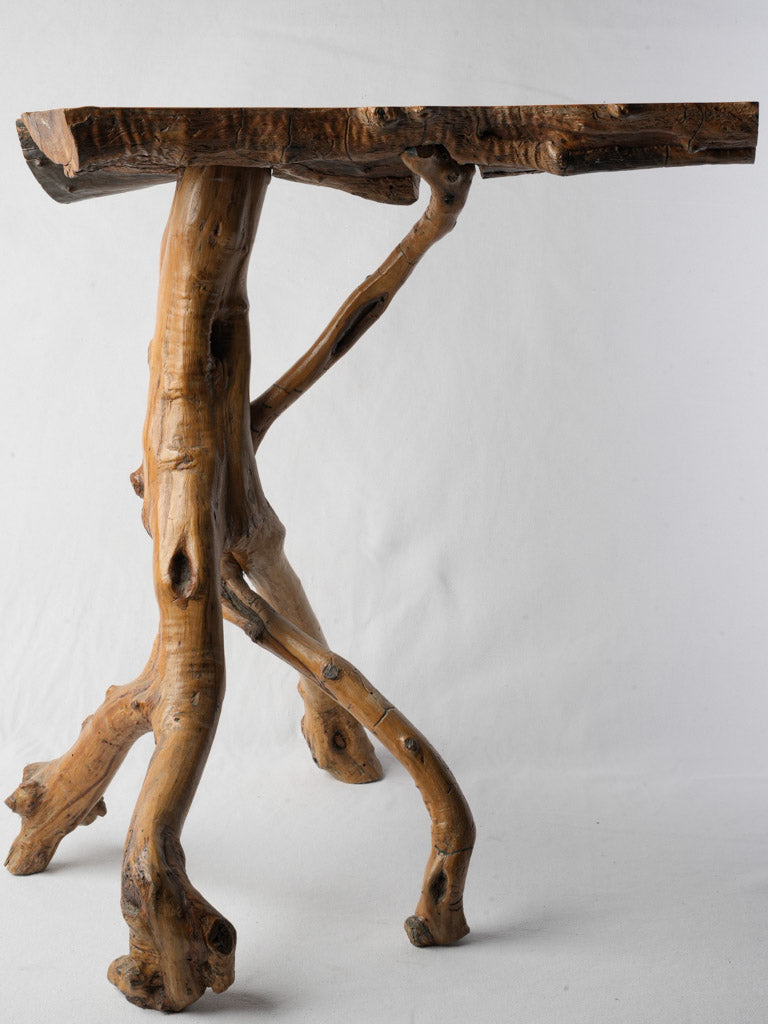 Petite twisted-leg accent table