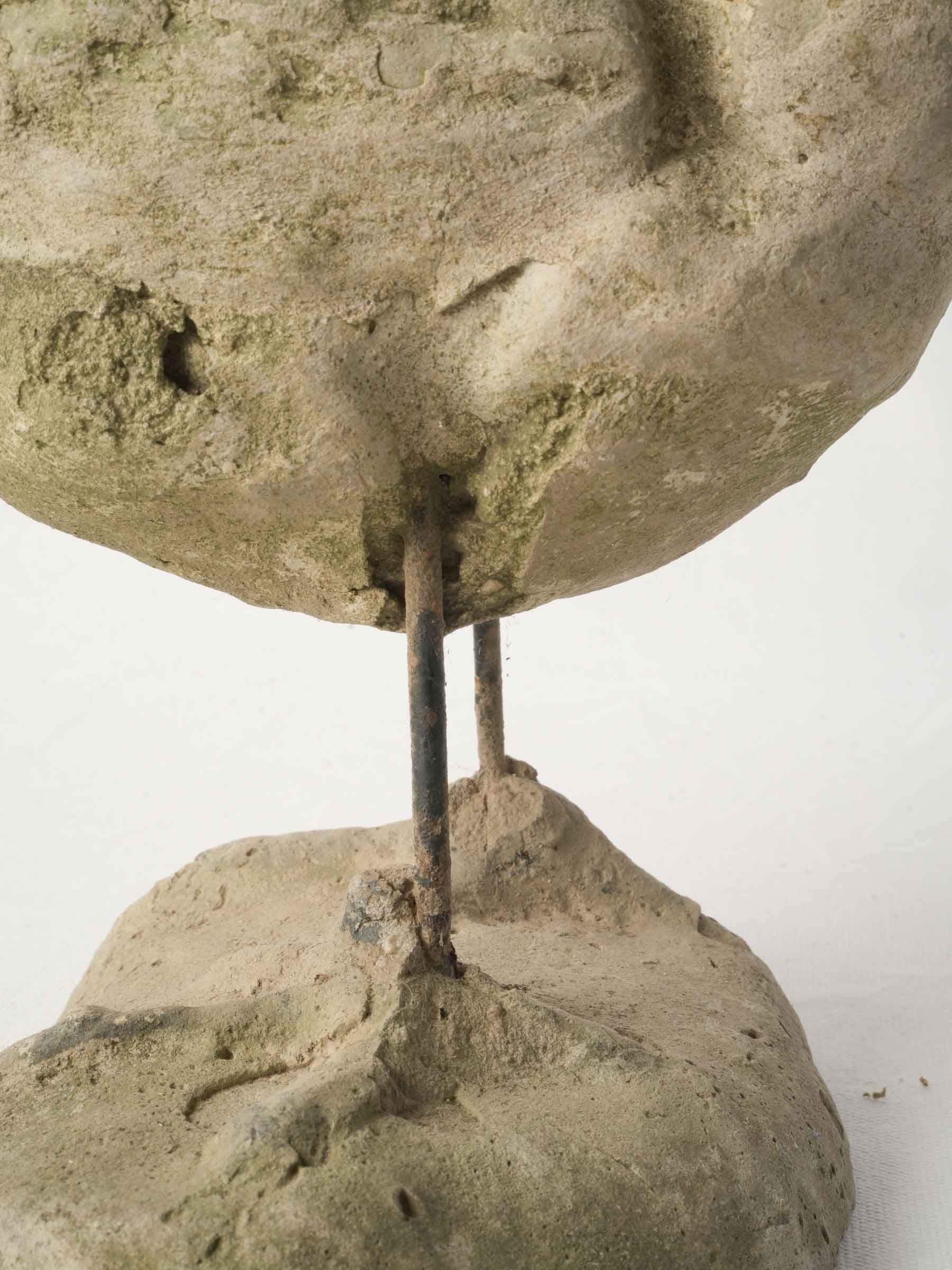 Naïve rustic concrete art piece