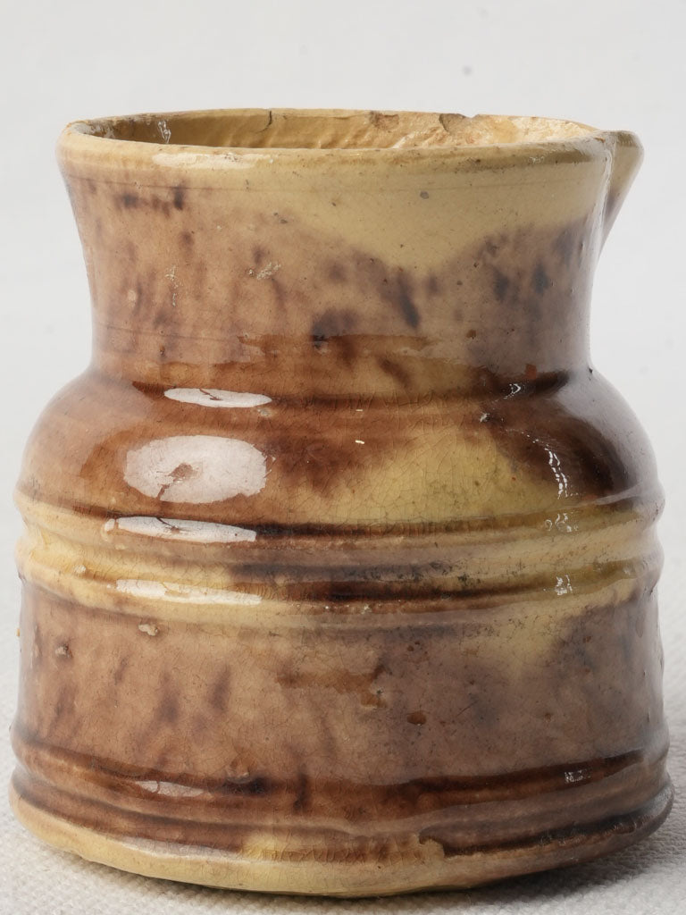 Warm-toned ceramic mini creamer