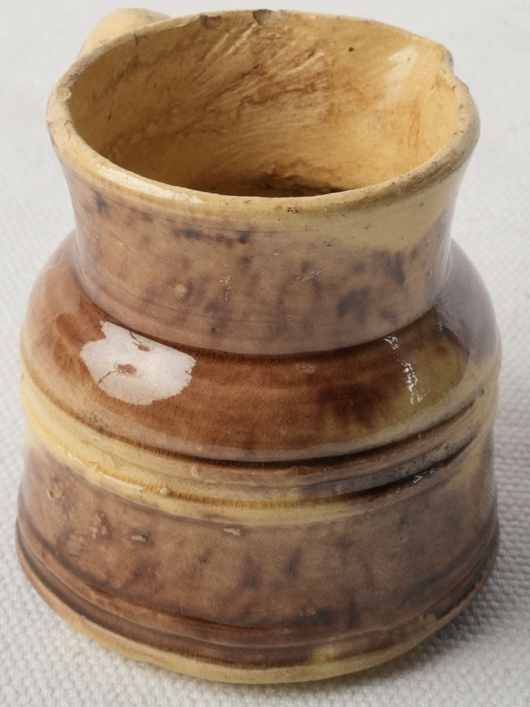 Compact handcrafted clay creamer