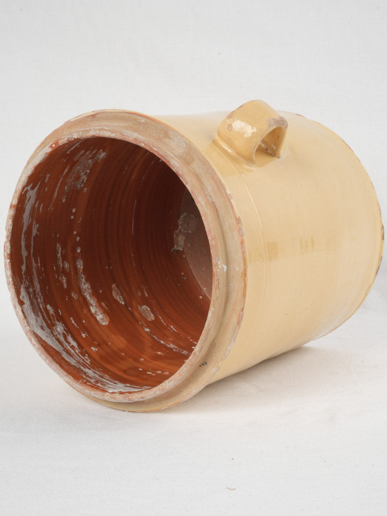 Old-world yellow-red interior preserve jar