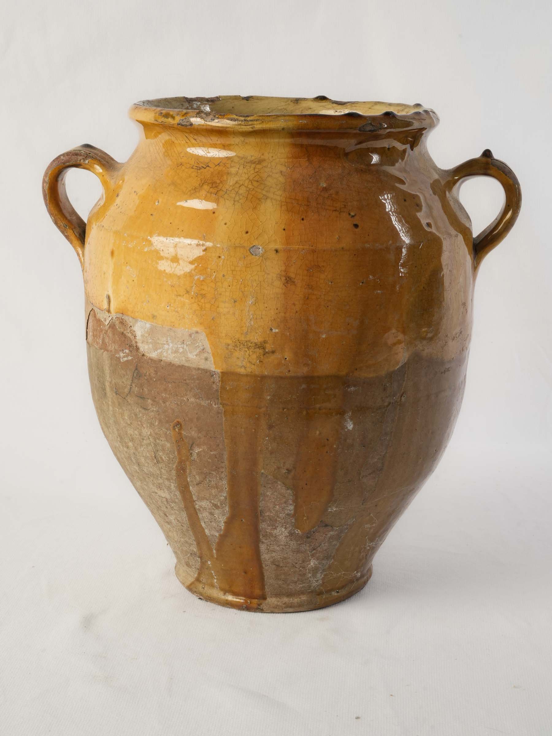 Aged handcrafted ovoid pottery container
