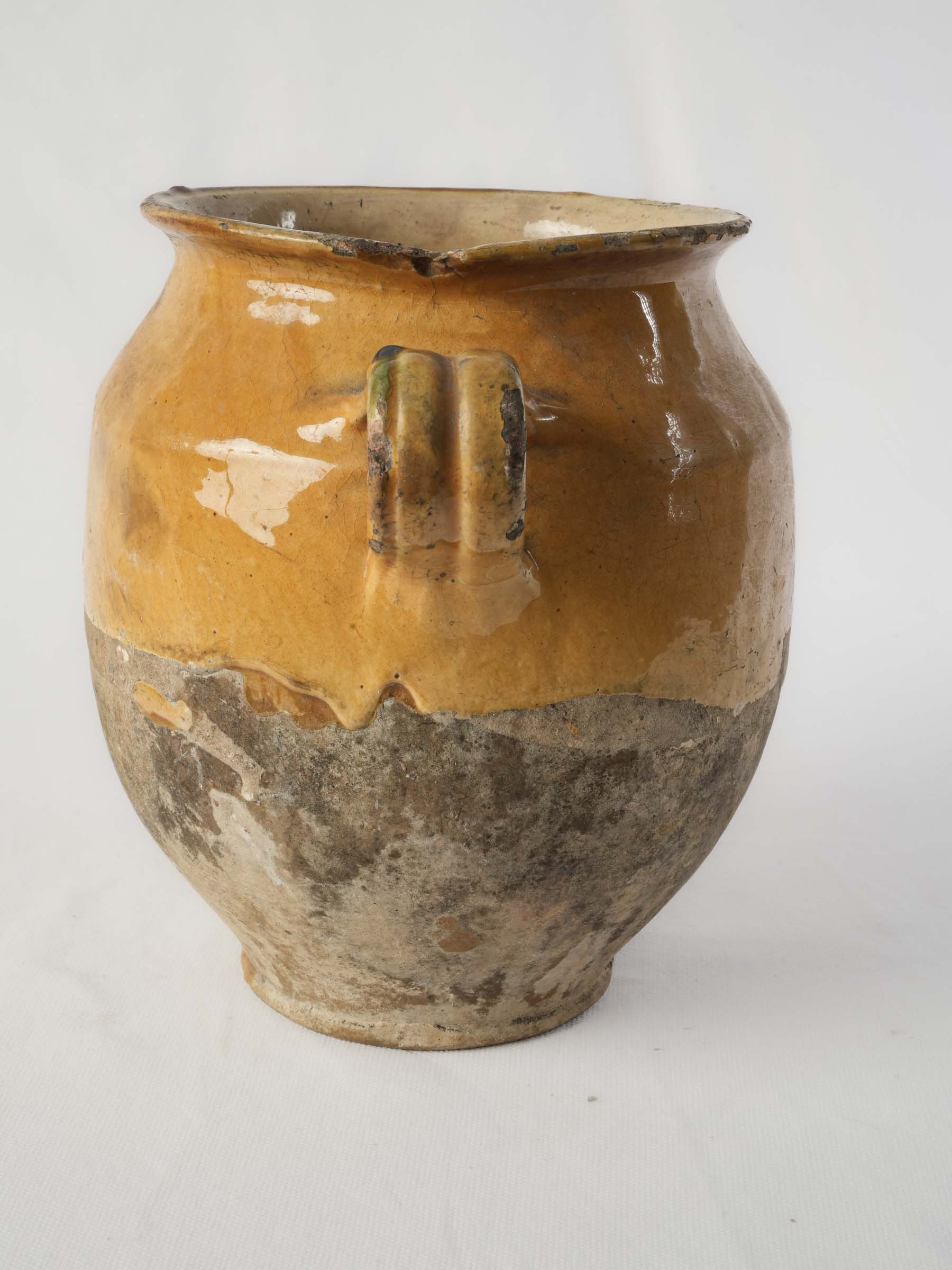 Mustard-yellow glazed ceramic vessel