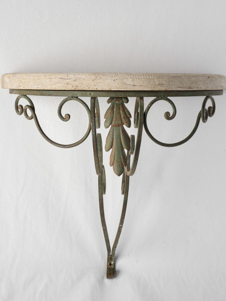 Weathered green iron wall bracket