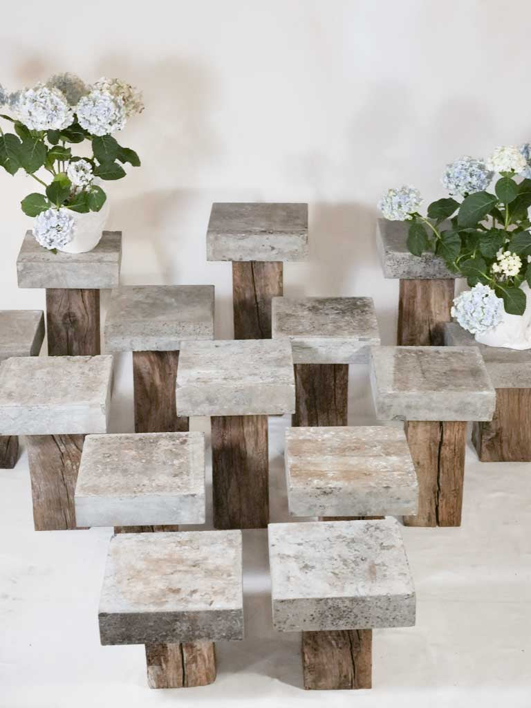 Collection of 14 bluestone and oak garden pedestals