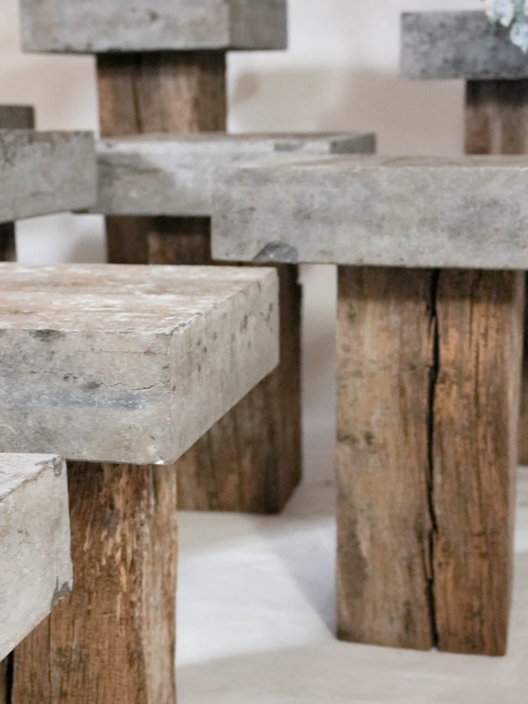 Collection of 14 bluestone and oak garden pedestals