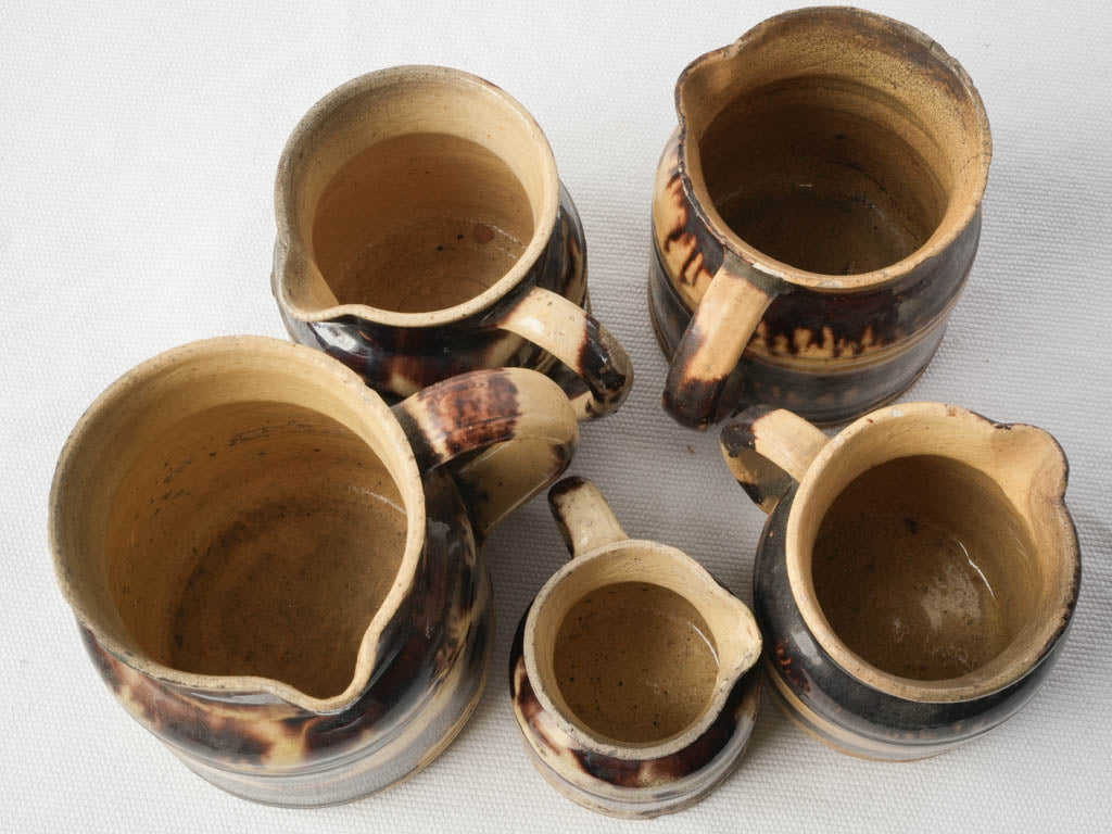Graduated Set Of Five Early 20th Century Dieulefit Ceramic Pitchers