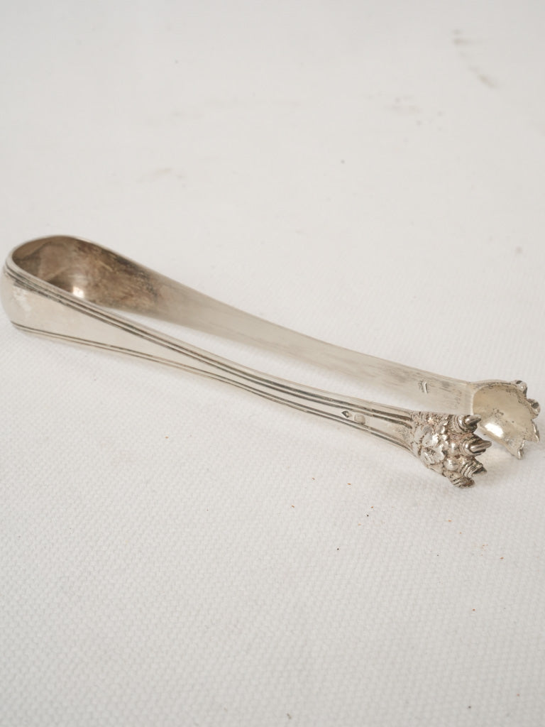 Sophisticated claw-tip silver tongs