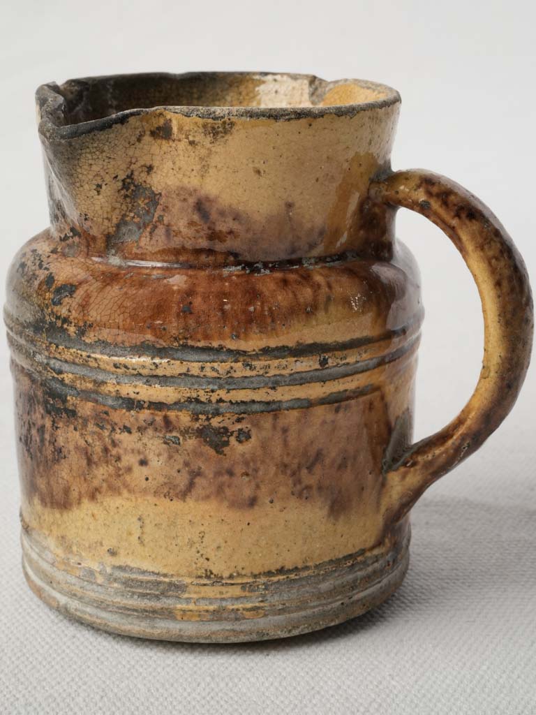 Timeworn rustic earthenware pitcher