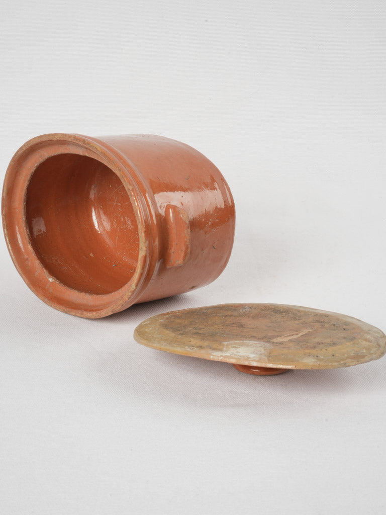 Time-worn terracotta ratatouille serving vessel