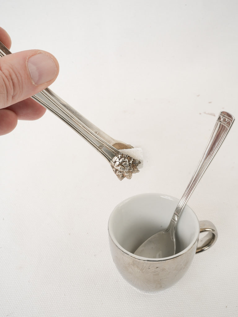 Antique floral-detailed serving tongs
