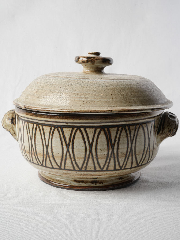 Earth-toned geometric frieze tureen