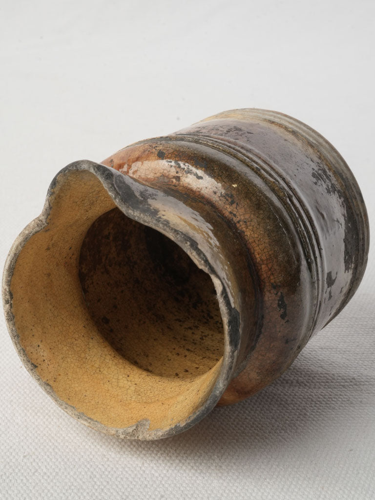 Caramel-toned antique pottery pitcher