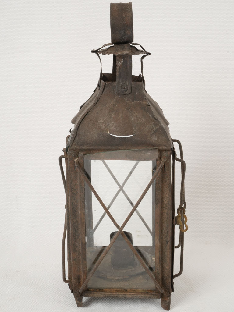 Aged iron candle holder