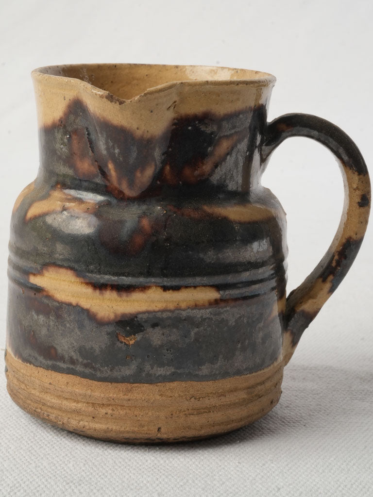 Hand-thrown traditional pottery vessel
