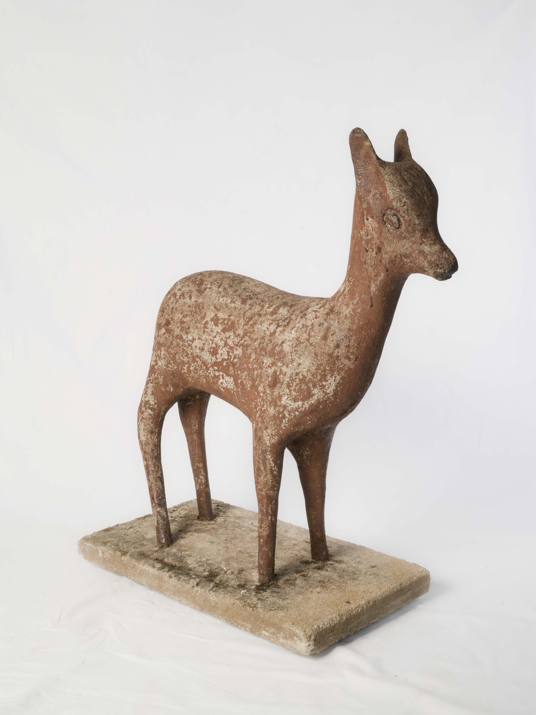 Weathered vintage concrete garden sculpture