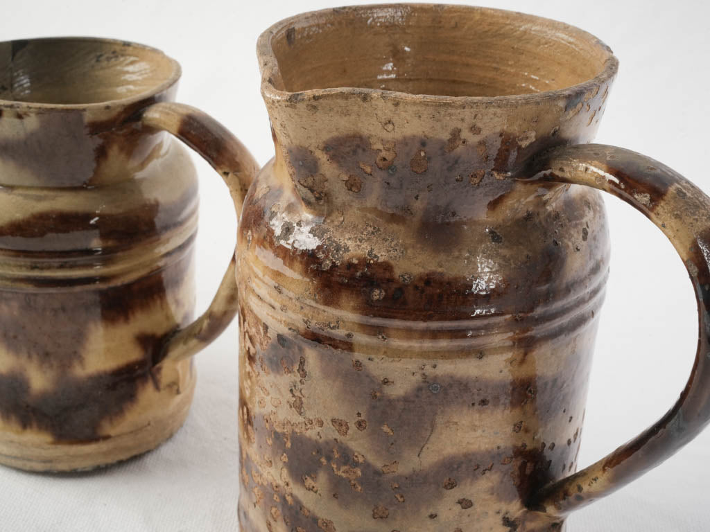 Earthy charcoal-glazed jugs
