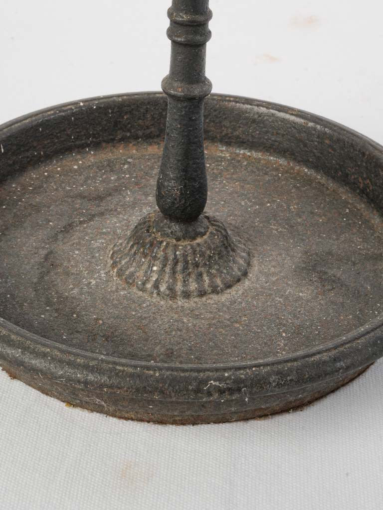 Dark metal vintage stick stand