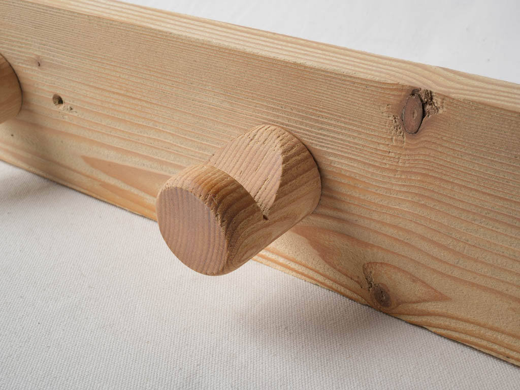 Textured grain wall coat hanger
