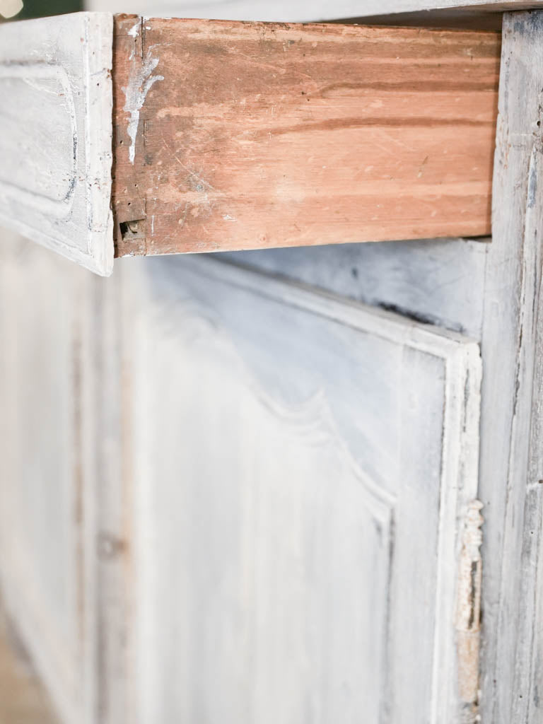 Three-section carved vitrine, fixed shelves