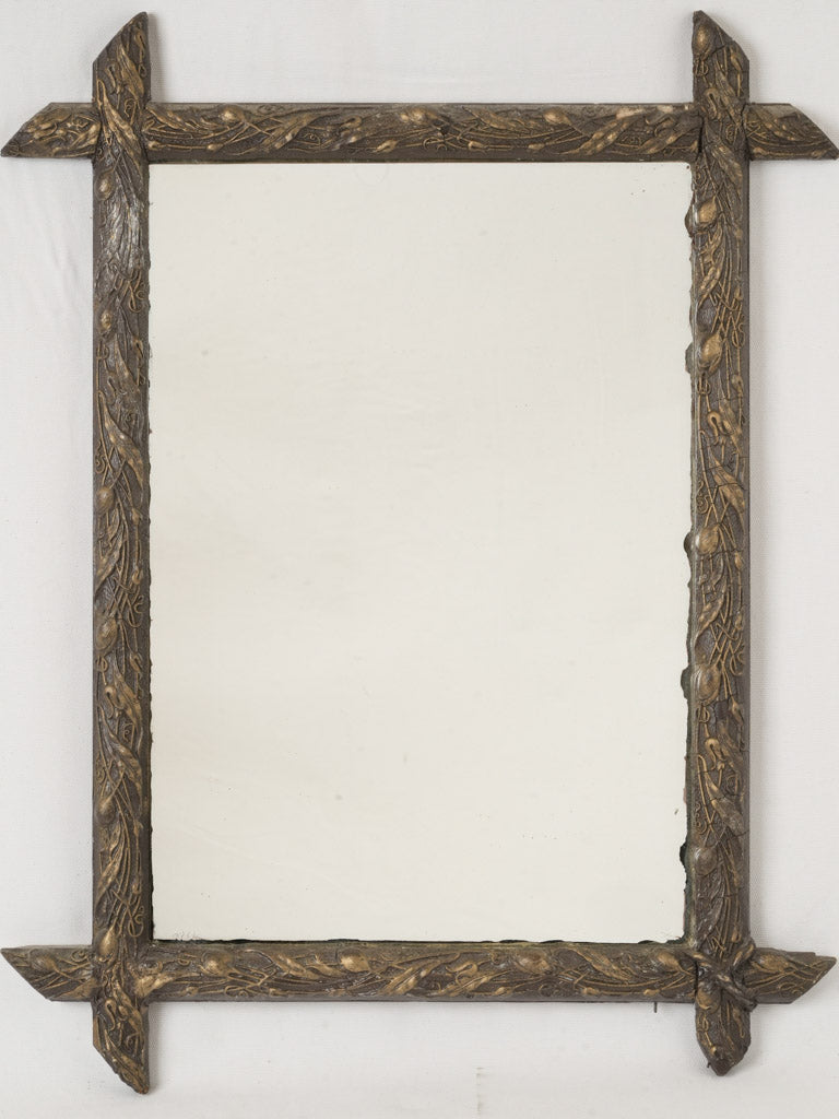 Intricate aged vintage Art Nouveau mirror