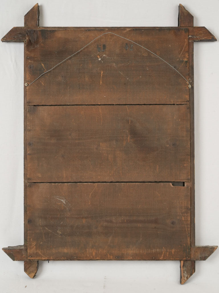 Vintage fluid motif statement mirror
