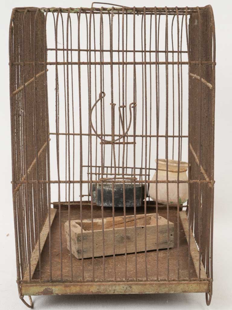 Simple utilitarian aesthetic birdcage