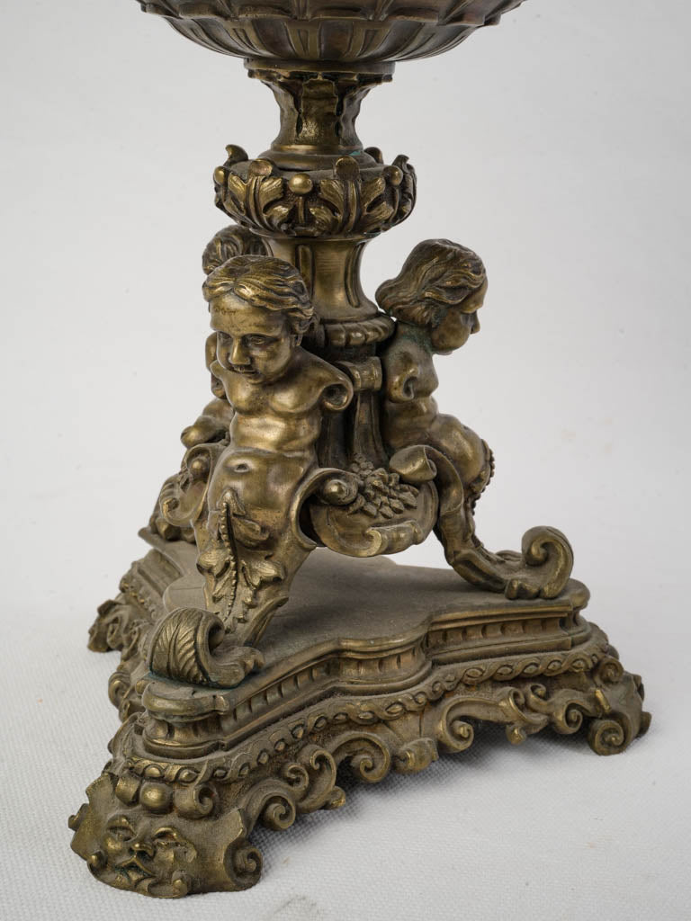 Elegant alabaster with bronzed tritons