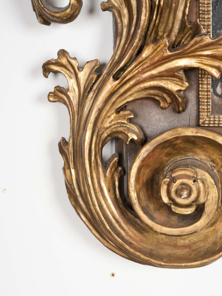 Opulent gold-finished Florentine wall mirror