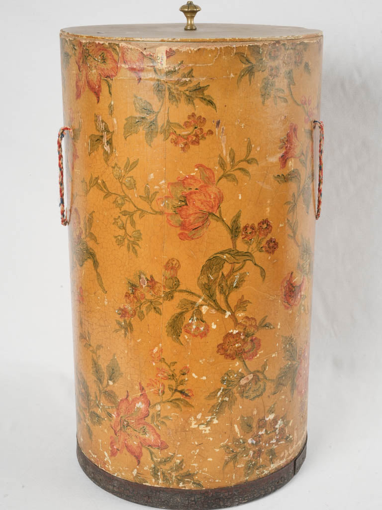 Classic yellow-background French hatbox receptacle