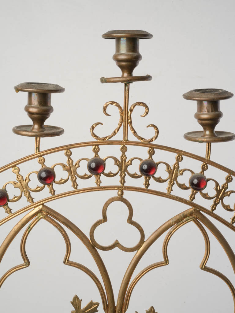Red cabochon brass candelabrum