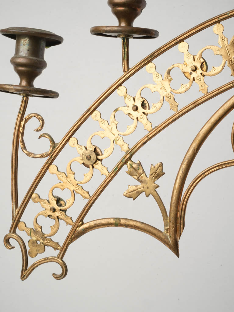 Quatrefoil pierced metalwork candelabrum