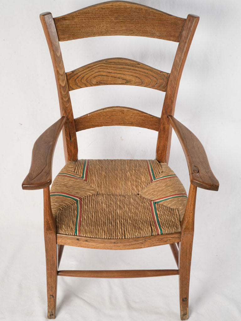 Elegant gently arched ladder-back chair