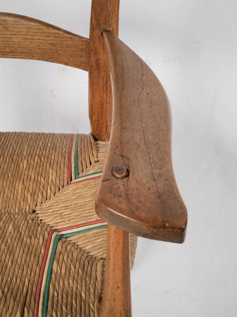 Artisanal colored straw seat armchair