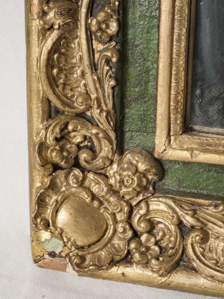 Exuberant French scrollwork mirror