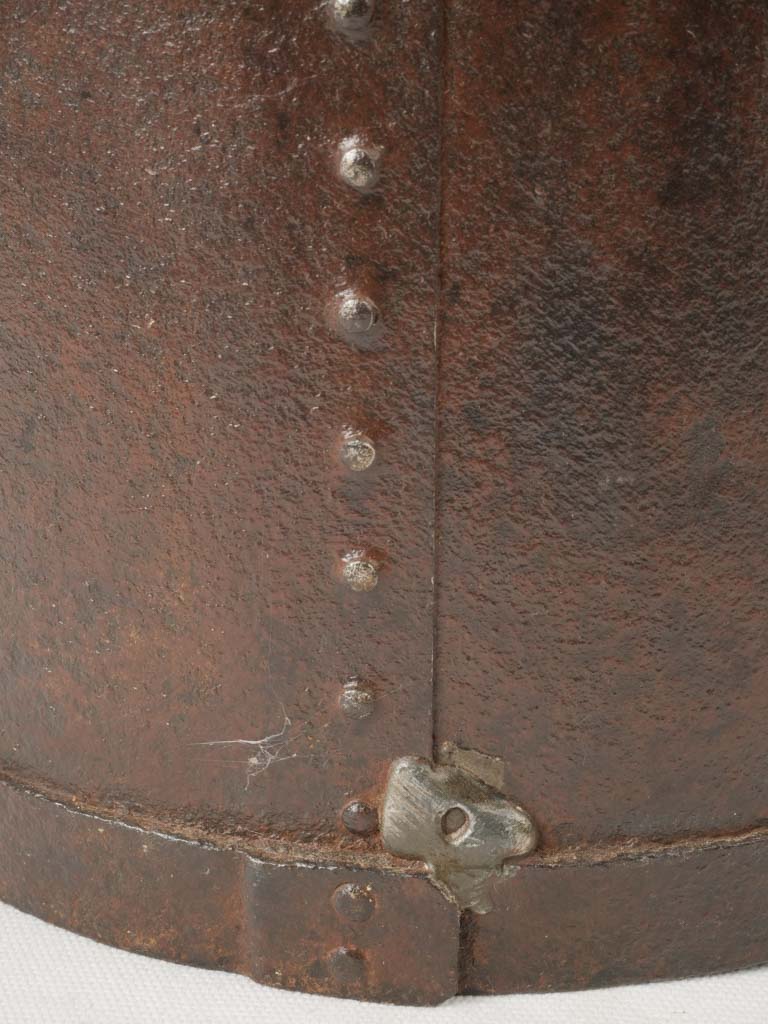 Riveted design heritage artifact