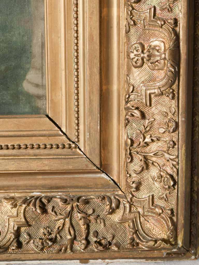 Intricate carved giltwood frame artwork