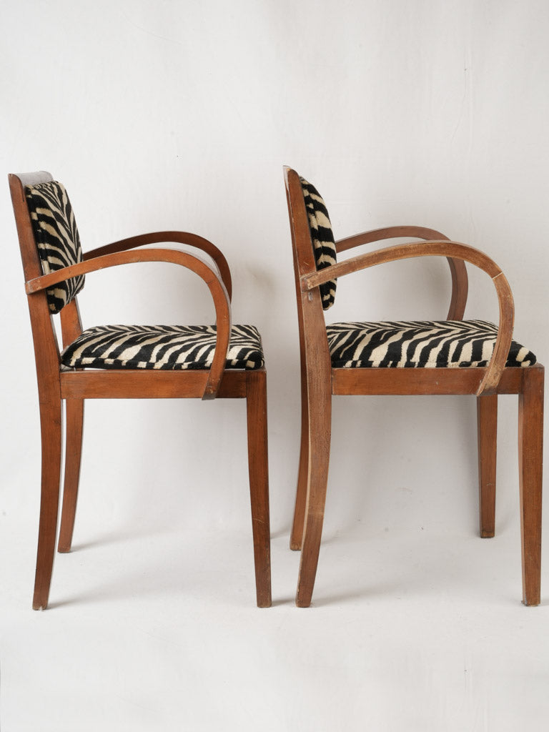 Sleek mid-century modern armchairs