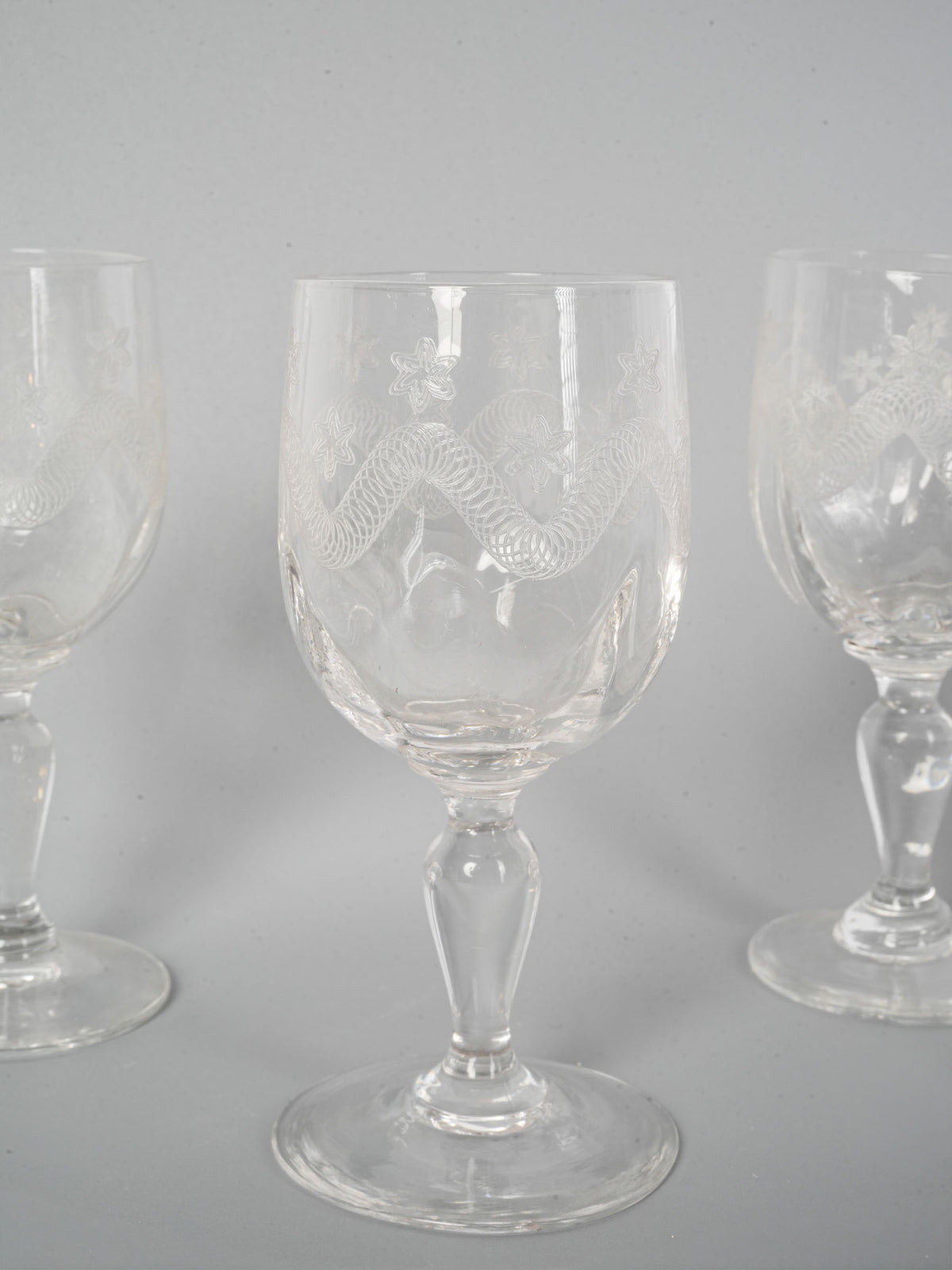 Transparent glass beverage vessels